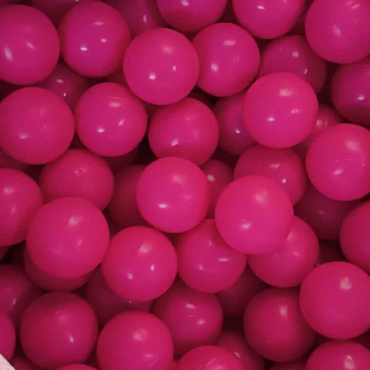 Open bulk bag of pink play balls