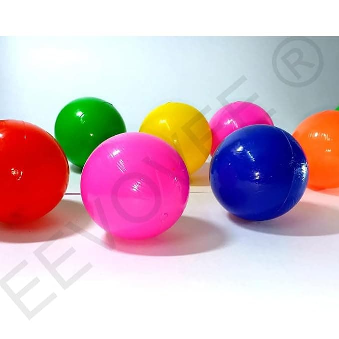 Kids play ball, side view